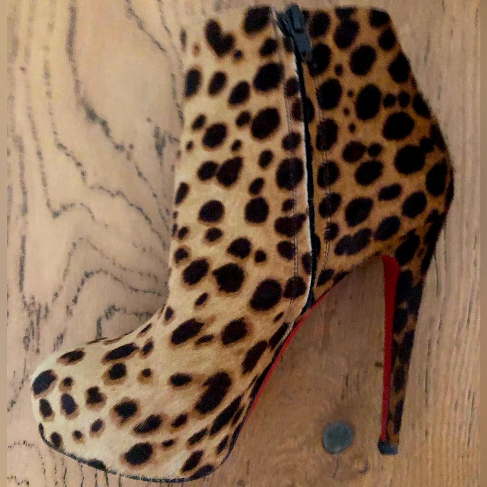 Christian Louboutin cheetah print calf hair boots
-size 37 EU